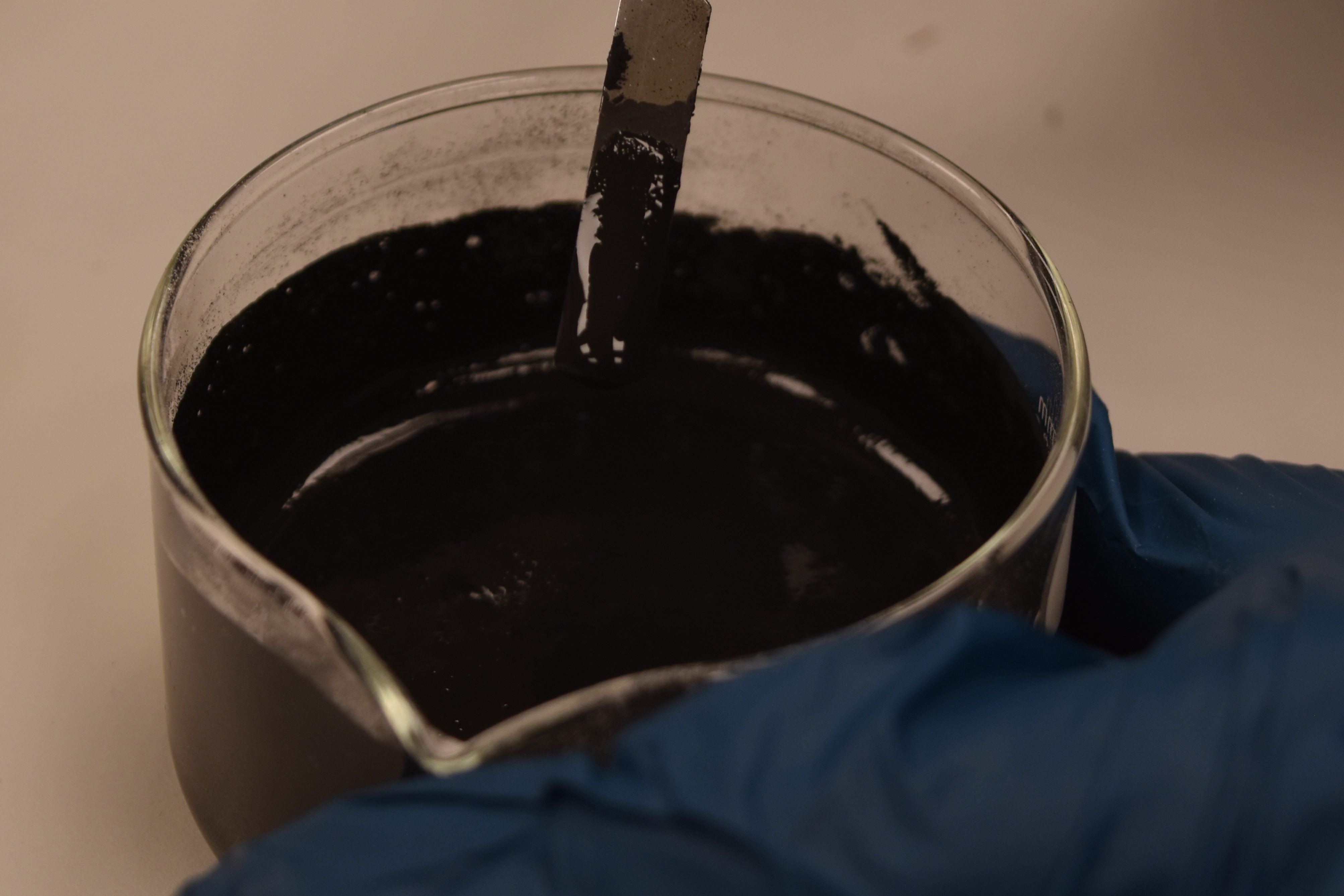 A glass container with the carbon black ink.